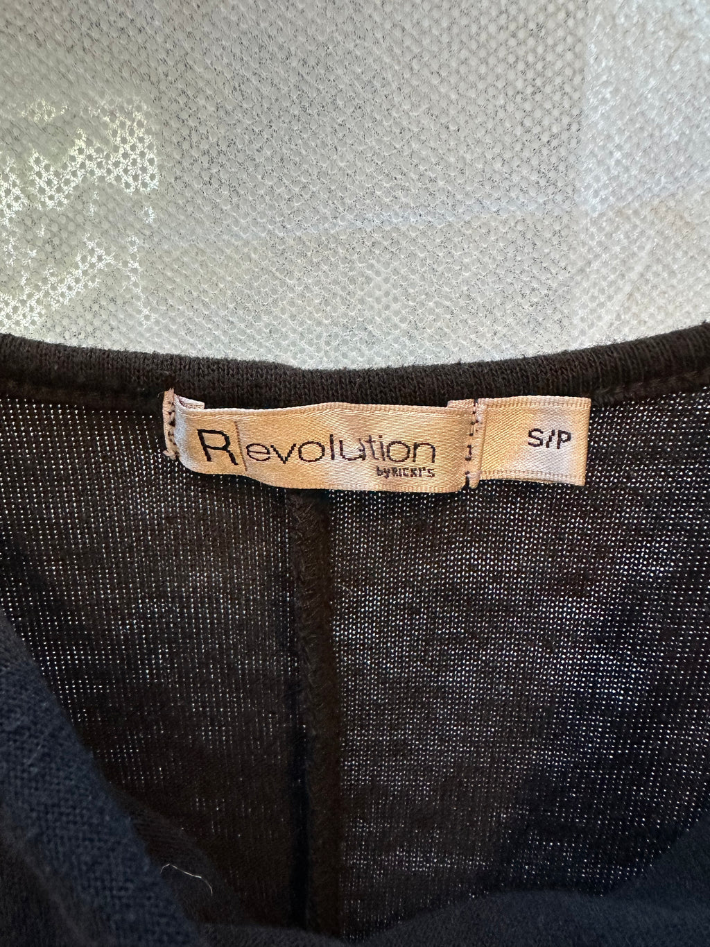 Revolution buckle drape top