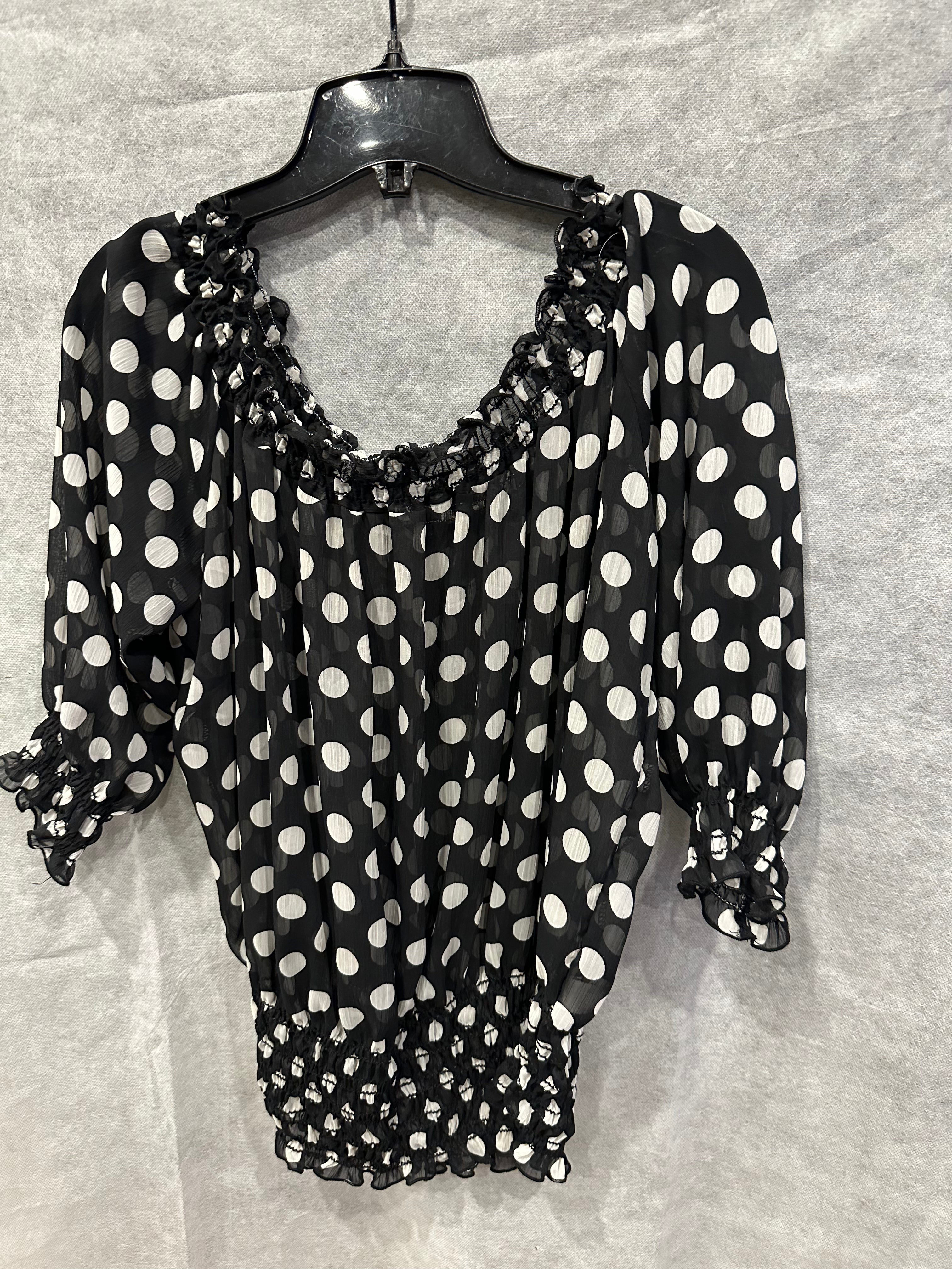 Polka dot sheer off shoulder top